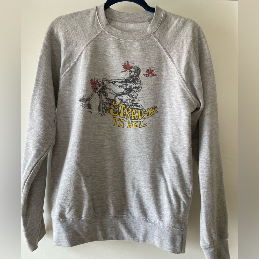 Light grey sweatshirt. Straight to hell logo.